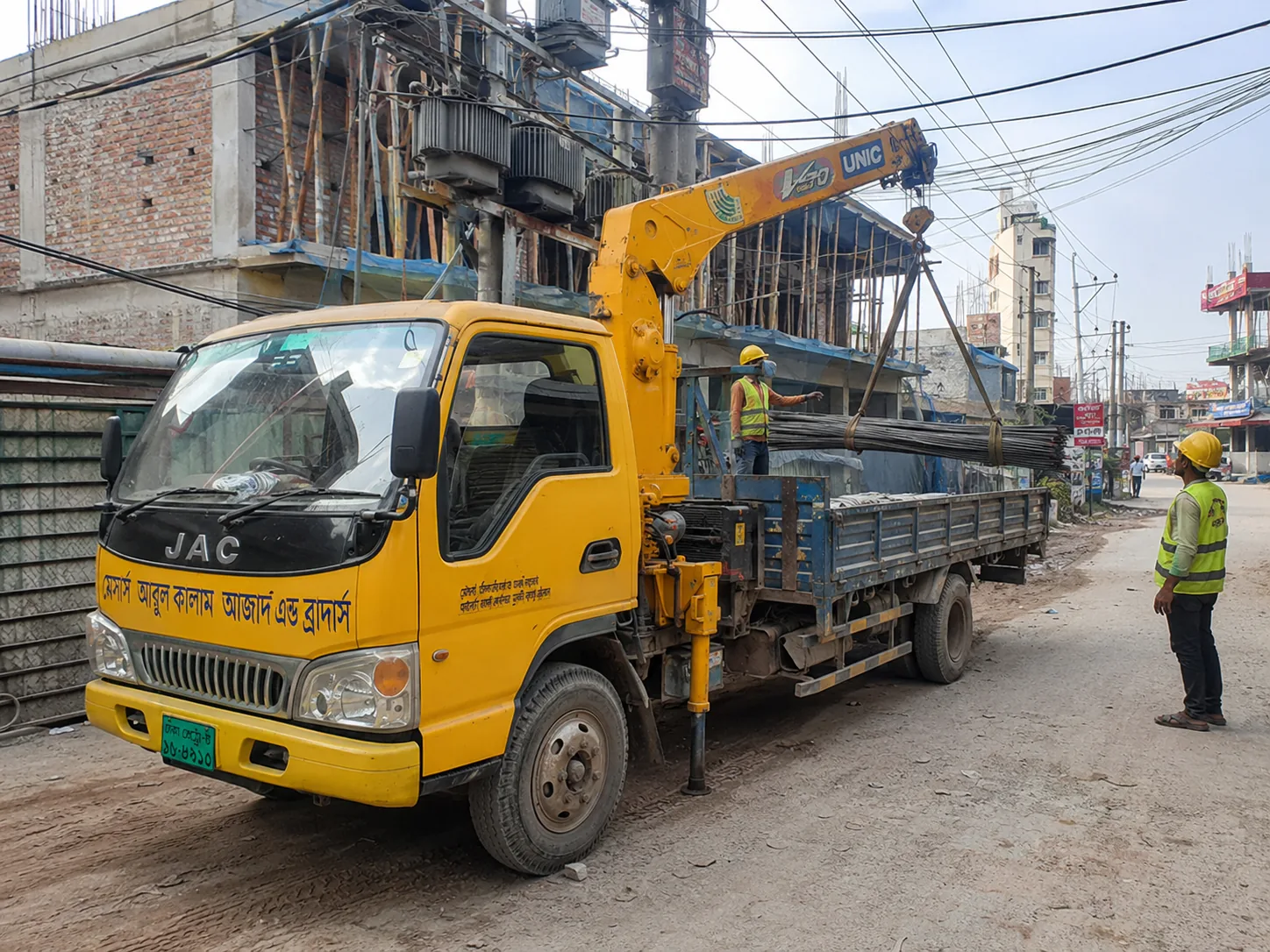 UNIC/Unique crane দিয়ে rebar handling